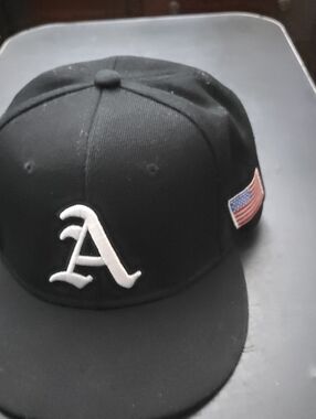Black Baseball Cap with White 'A' and American Flag Patch